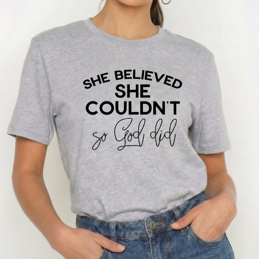 Camiseta "She Believed She Couldn’t So God Did" T-shirt